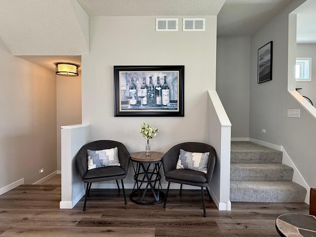 4848 161st St W, Lakeville, MN 55044 - sitting room featuring wood finished floors, baseboards, and an upstairs landing
