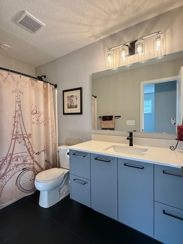 4848 161st St W, Lakeville, MN 55044 - full bathroom with toilet, a textured ceiling, vanity, and tile patterned flooring