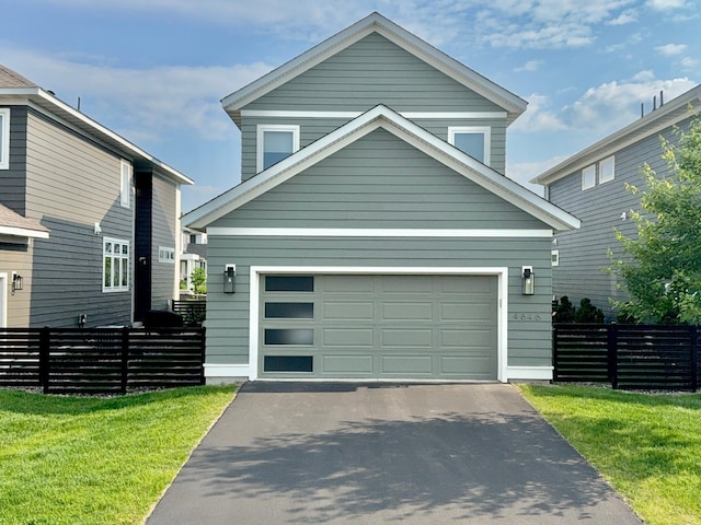 4848 161st St W, Lakeville, MN 55044 - view of front facade with a garage and asphalt driveway