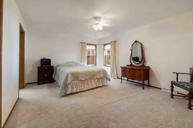 505 Superior Ave, Crosby, MN 56441 - carpeted bedroom with baseboards and a ceiling fan