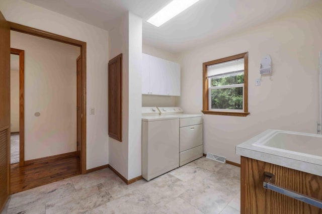 505 Superior Ave, Crosby, MN 56441 - laundry area featuring cabinet space and washer and clothes dryer