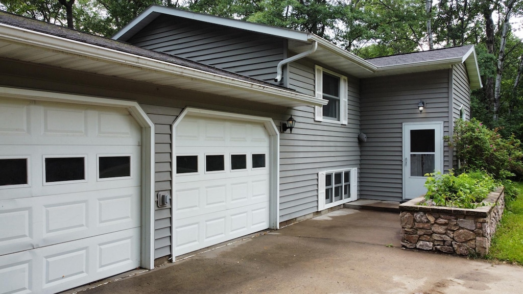 16087 Birch Ln, Brainerd, MN 56401 - view of property exterior with driveway