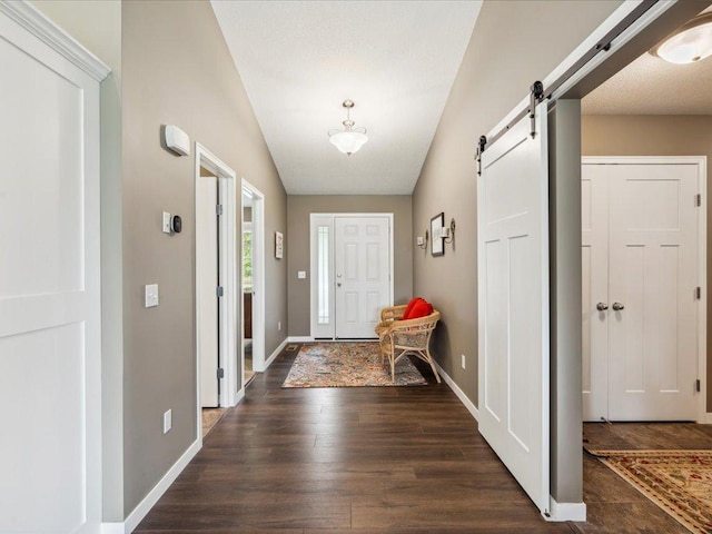 9308 Viking St, Brainerd, MN 56401 - foyer entrance with a barn door and wood finished floors