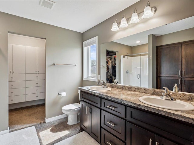9308 Viking St, Brainerd, MN 56401 - full bath featuring a stall shower, double vanity, and a spacious closet
