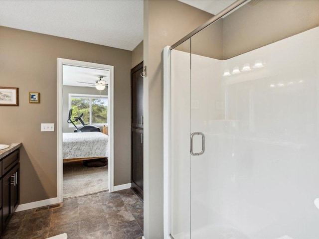 9308 Viking St, Brainerd, MN 56401 - bathroom with a stall shower, vanity, connected bathroom, and stone finish floors