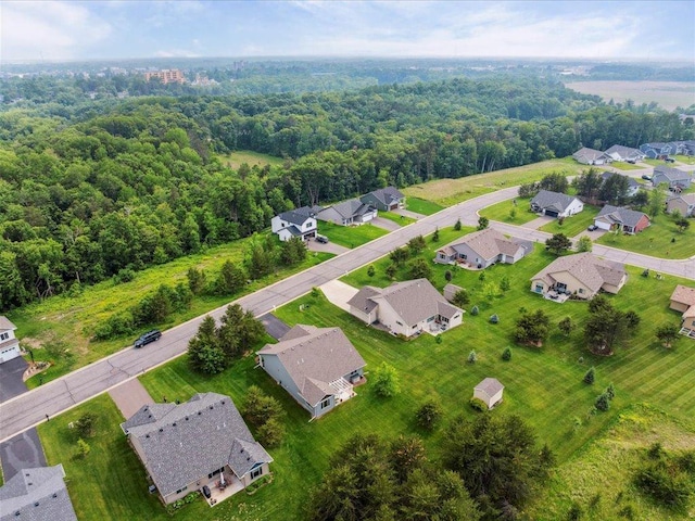 9308 Viking St, Brainerd, MN 56401 - aerial perspective of suburban area featuring a heavily wooded area