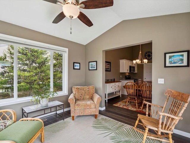 9308 Viking St, Brainerd, MN 56401 - living area featuring lofted ceiling, a chandelier, wood finished floors, and ceiling fan