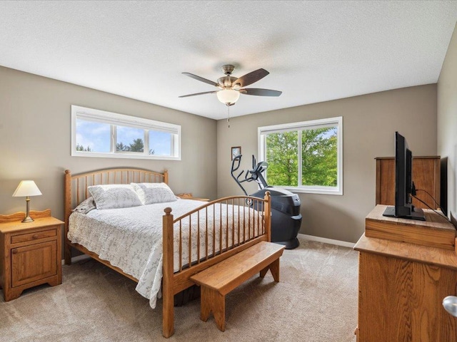 9308 Viking St, Brainerd, MN 56401 - bedroom with light colored carpet and ceiling fan