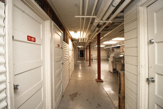 3128 Bde Maka Ska Blvd Unit 415, Minneapolis, MN 55416 - corridor featuring unfinished concrete floors