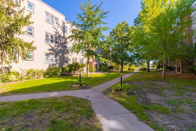 3128 Bde Maka Ska Blvd Unit 415, Minneapolis, MN 55416 - view of property's community featuring a yard