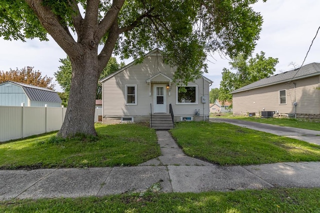 509 8th Ave SE, Waseca, MN 56093 - bungalow-style house with central air condition unit