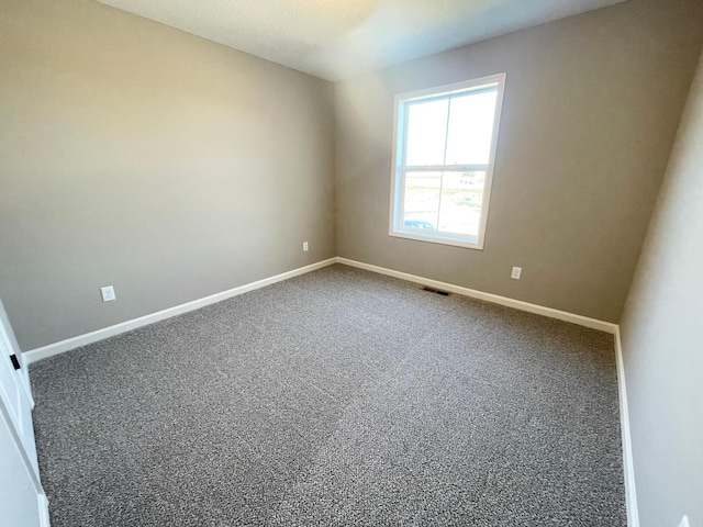 4818 163rd St N, Hugo, MN 55038 - carpeted empty room featuring baseboards