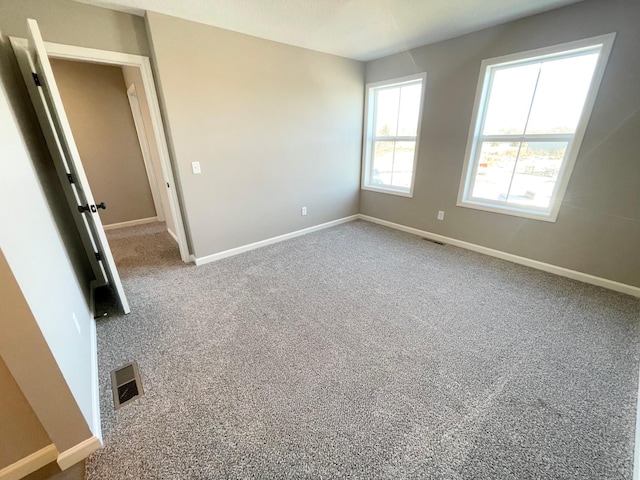 4818 163rd St N, Hugo, MN 55038 - empty room featuring carpet floors and baseboards