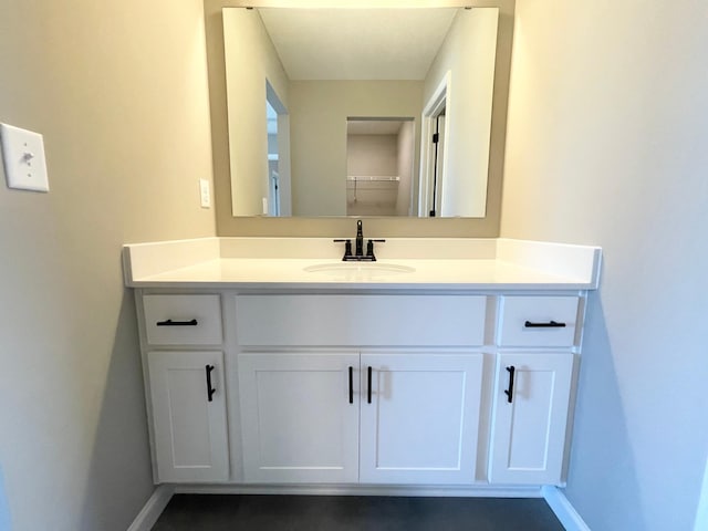 4818 163rd St N, Hugo, MN 55038 - bathroom featuring baseboards and vanity