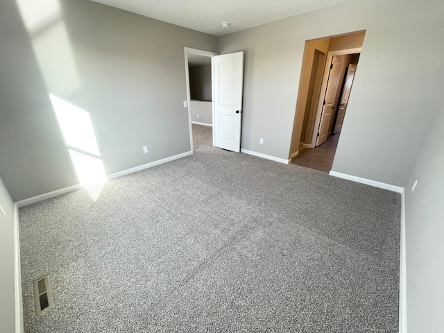 4818 163rd St N, Hugo, MN 55038 - unfurnished bedroom featuring baseboards and carpet floors