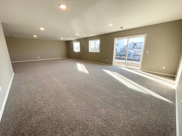 4818 163rd St N, Hugo, MN 55038 - spare room featuring baseboards, carpet flooring, and recessed lighting