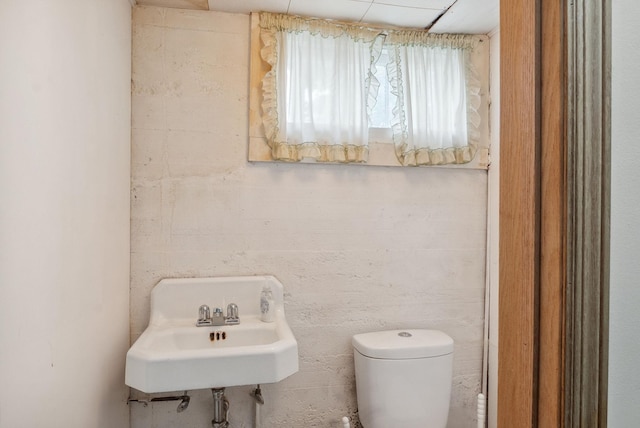517 Birch Ave, Moose Lake, MN 55767 - half bathroom featuring a sink and toilet