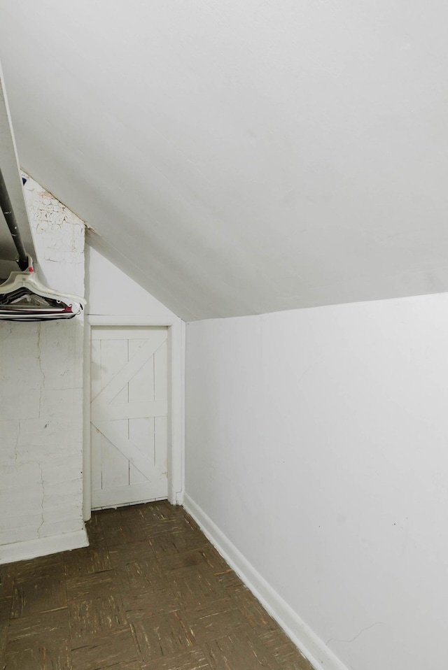 517 Birch Ave, Moose Lake, MN 55767 - additional living space with vaulted ceiling and baseboards