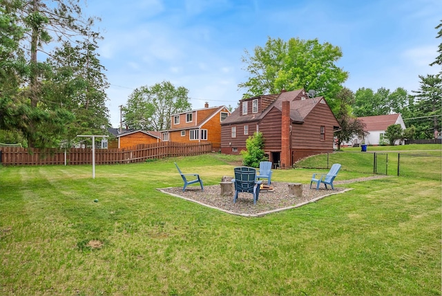 517 Birch Ave, Moose Lake, MN 55767 - view of yard featuring an outdoor fire pit