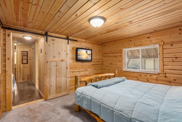 134315 Lone Pine Ln, Garfield Twp, WI 54001 - carpeted bedroom with a barn door, wood ceiling, and wooden walls