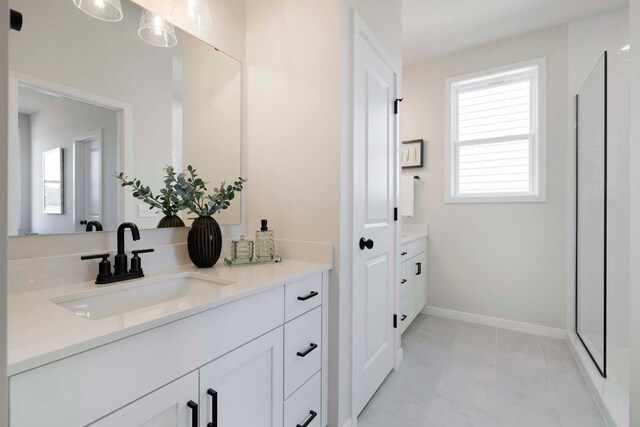 12443 Drayton Trl, Apple Valley, MN 55124 - full bath with vanity, healthy amount of natural light, baseboards, and a shower