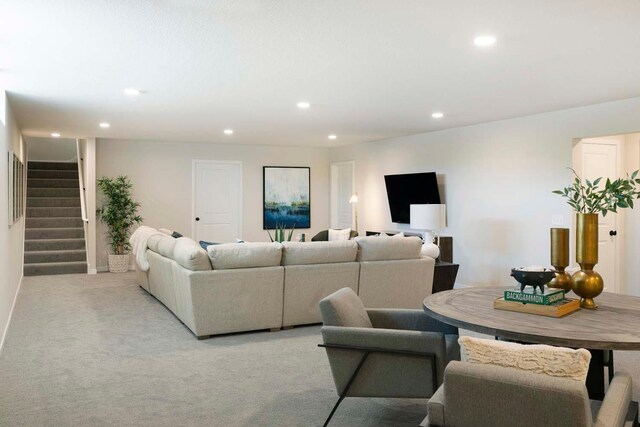 12443 Drayton Trl, Apple Valley, MN 55124 - living room featuring recessed lighting, stairs, and light carpet