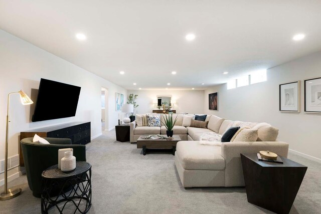 12443 Drayton Trl, Apple Valley, MN 55124 - living area featuring light carpet, recessed lighting, and baseboards