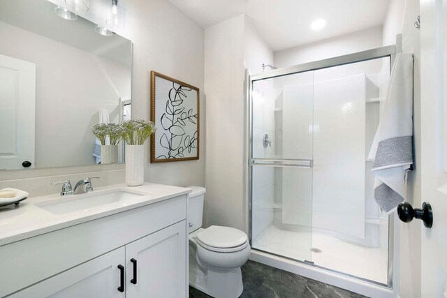 12443 Drayton Trl, Apple Valley, MN 55124 - bathroom with toilet, vanity, and a shower stall