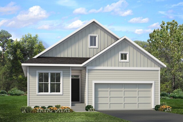12443 Drayton Trl, Apple Valley, MN 55124 - view of front of house featuring board and batten siding, driveway, a front lawn, roof with shingles, and a garage