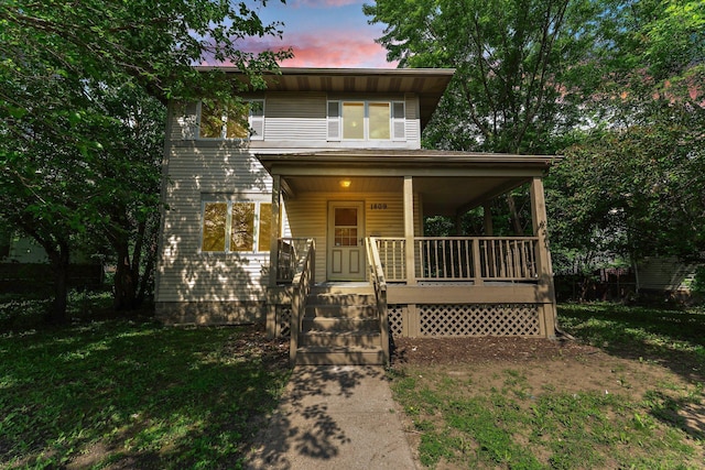 1809 Penn Ave N, Minneapolis, MN 55411 - view of front of home with a porch and a front yard