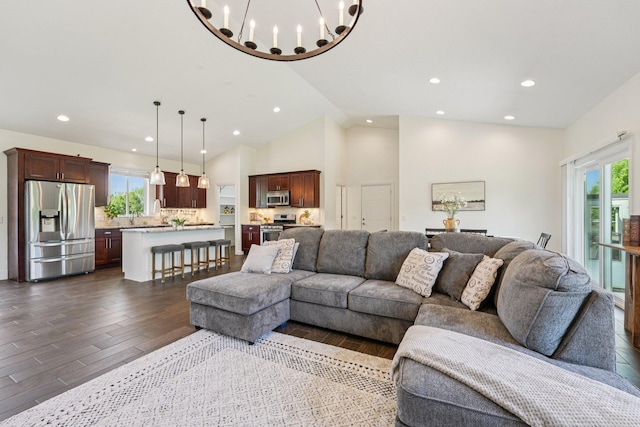 7482 250th St, New Market Twp, MN 55020 - living area with recessed lighting, dark wood-type flooring, a chandelier, and high vaulted ceiling