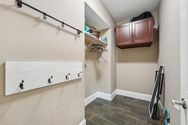 7482 250th St, New Market Twp, MN 55020 - walk in closet featuring wood finish floors