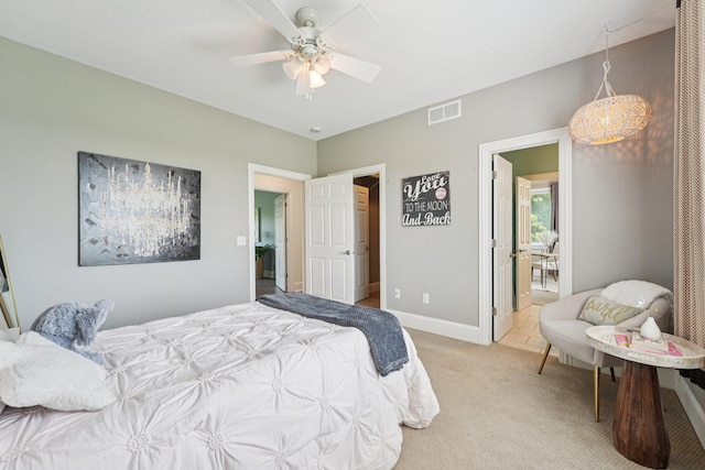 7482 250th St, New Market Twp, MN 55020 - bedroom featuring light colored carpet and a ceiling fan