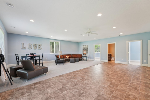 7482 250th St, New Market Twp, MN 55020 - living area featuring plenty of natural light, ceiling fan, and recessed lighting