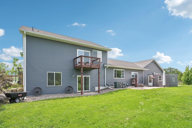 7482 250th St, New Market Twp, MN 55020 - rear view of house featuring a patio, a balcony, and a lawn