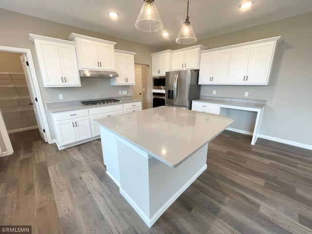 16290 Fairoaks Ave N, Hugo, MN 55038 - kitchen with stainless steel appliances, light countertops, white cabinetry, a kitchen island, and dark wood-style flooring