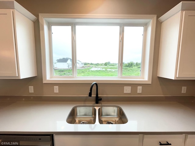 16290 Fairoaks Ave N, Hugo, MN 55038 - kitchen featuring white cabinets and dishwasher