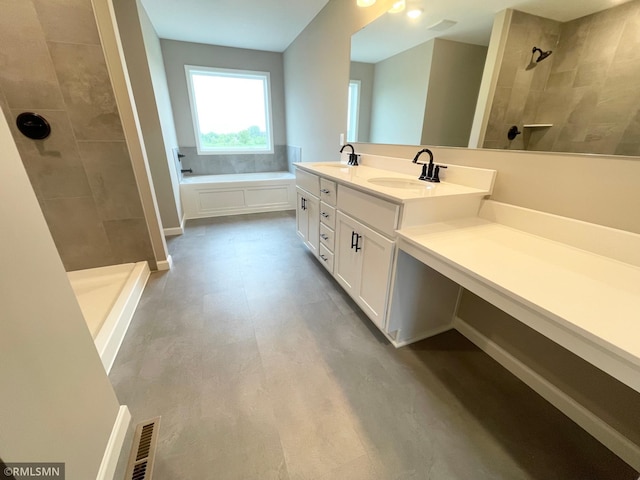 16290 Fairoaks Ave N, Hugo, MN 55038 - bathroom featuring tiled shower, double vanity, and a garden tub