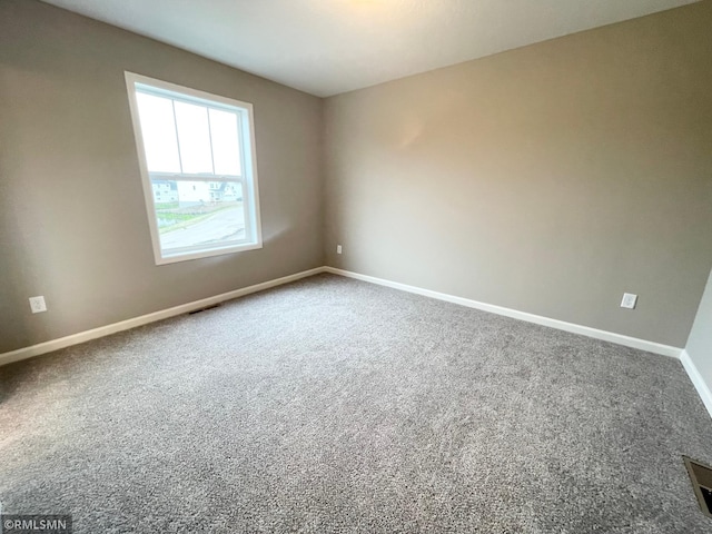 16290 Fairoaks Ave N, Hugo, MN 55038 - empty room with baseboards and carpet flooring