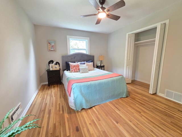 4106 Woodbine Ln N, Brooklyn Center, MN 55429 - bedroom with light wood-style floors, baseboards, and ceiling fan