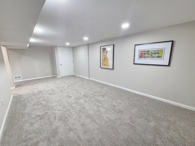 4106 Woodbine Ln N, Brooklyn Center, MN 55429 - finished basement with recessed lighting, carpet flooring, a textured ceiling, and baseboards