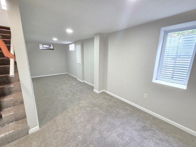4106 Woodbine Ln N, Brooklyn Center, MN 55429 - basement featuring carpet flooring, stairs, baseboards, and recessed lighting