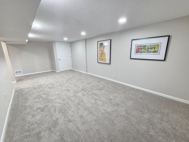 4106 Woodbine Ln N, Brooklyn Center, MN 55429 - finished basement featuring recessed lighting, carpet floors, baseboards, and a textured ceiling