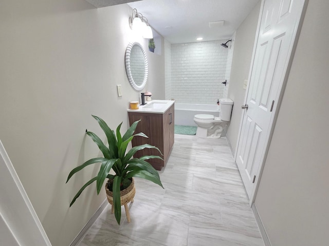4106 Woodbine Ln N, Brooklyn Center, MN 55429 - bathroom featuring vanity, toilet, marble finish flooring, and baseboards