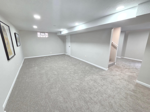 4106 Woodbine Ln N, Brooklyn Center, MN 55429 - below grade area with recessed lighting, carpet, baseboards, and stairs
