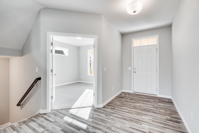 16296 Fairoaks Ave N, Hugo, MN 55038 - foyer entrance featuring wood finished floors and baseboards