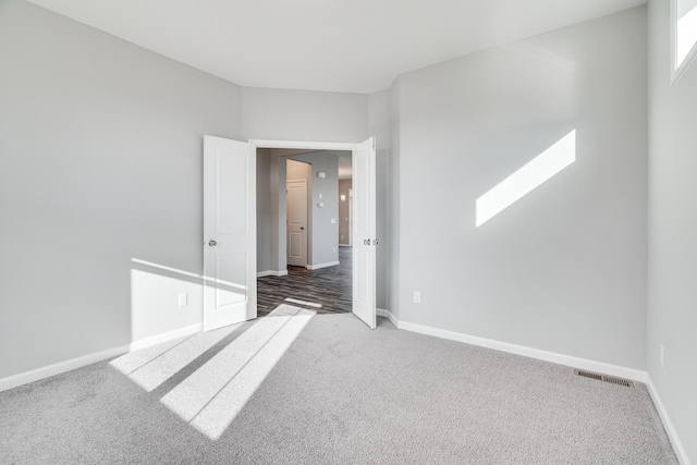 16296 Fairoaks Ave N, Hugo, MN 55038 - empty room featuring carpet floors and baseboards