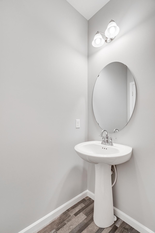 16296 Fairoaks Ave N, Hugo, MN 55038 - bathroom with wood finished floors, baseboards, and a sink