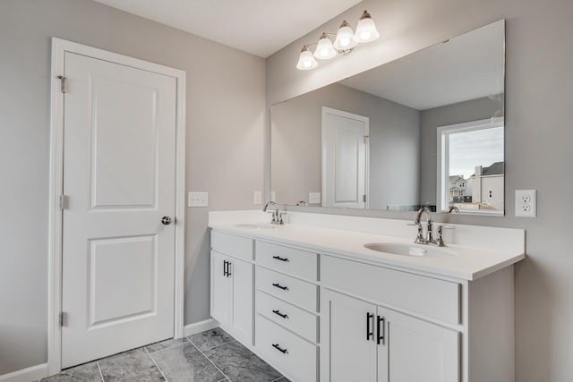 16296 Fairoaks Ave N, Hugo, MN 55038 - full bath featuring double vanity, baseboards, and marble finish floors