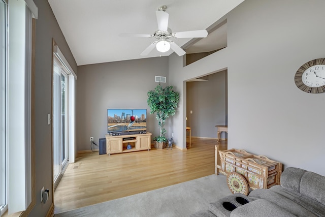 10777 181st Cir NW, Elk River, MN 55330 - living area with ceiling fan, light wood-style flooring, and high vaulted ceiling